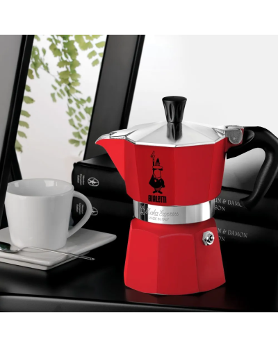 Bialetti Moka Express 3 Cups Red- on desk with coffee cup