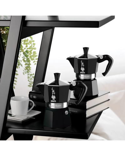 Bialetti Moka Express 3 Cups Black on bedside by coffee cup
