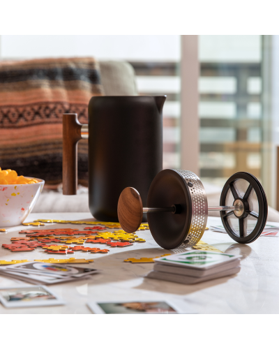 Fellow Clara French Press Matte Black With Walnut Handle on table