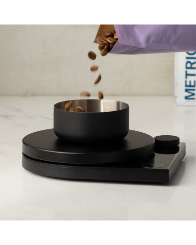 Fellow Tally Pro Digital Scale pouring beans from coffee bag