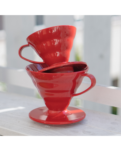 Hario V60 Plastic Dripper 02 Red 01 and 02 on table.