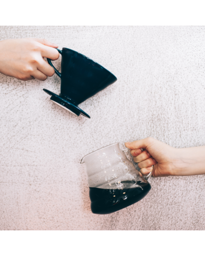 Hario V60 Ceramic Dripper 02 Indigo Blue against wall