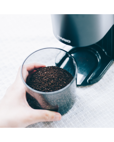 Hario V60 Electric Coffee Grinder Compact with coffee