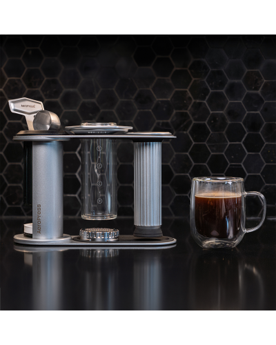 Aeropress Stainless Steel Organizer in kitchen with coffee cup