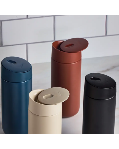 Fellow Carter Slide Mug 12oz Sienna with other coloured mugs on kitchentop