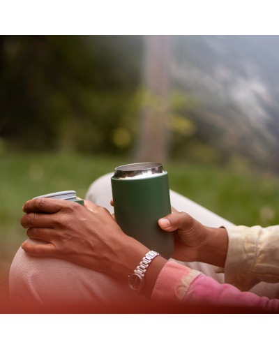 Person outdoors drinking from Fellow Carter Slide Mug 12oz Smoke Green