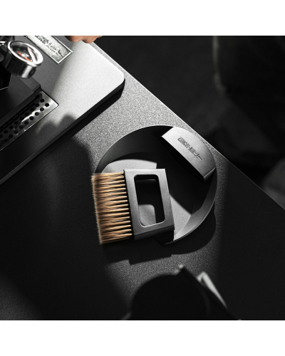 MHW3Bomber Coffee Bar Brush Black next to coffee grinder